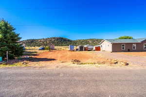 View of yard with a mountain view