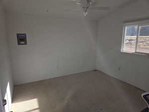 Unfurnished room featuring ceiling fan