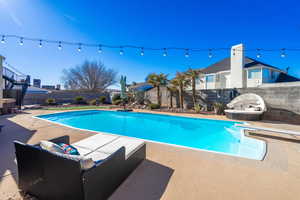 View of pool featuring a patio area