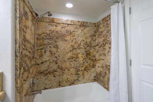 Bathroom with shower / tub combo