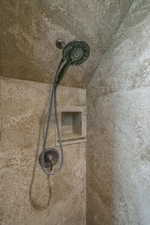 Interior details featuring walk in shower