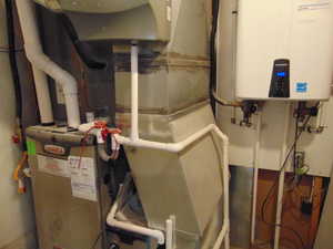 Utility room with tankless water heater