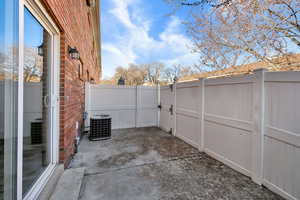 View of patio with central AC