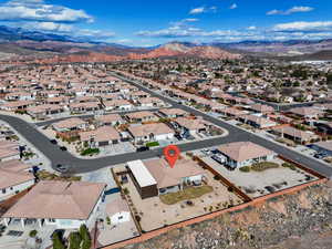 Birds eye view of property featuring a mountain view