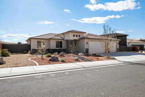 View of front of home featuring a garage