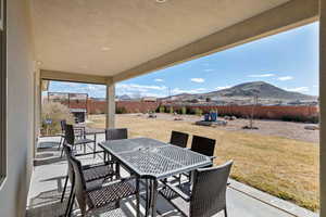 View of patio / terrace with a mountain view