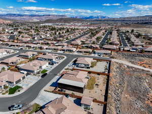 Birds eye view of property with a mountain view