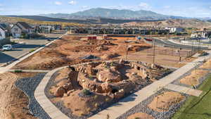 Birds eye view of property with a mountain view