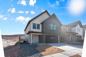 View of front of property with a garage