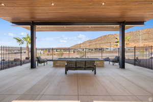 View of patio / terrace with a mountain view