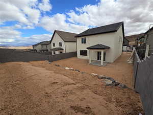 Back of property featuring a patio