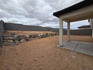 View of yard with a patio