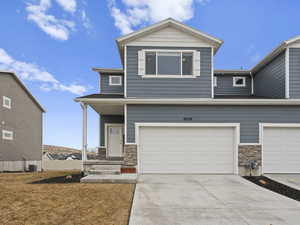 View of front facade with a garage