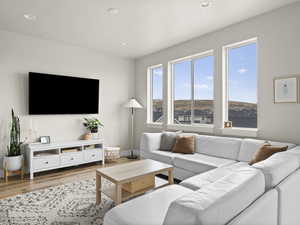 Living room with light wood-type flooring