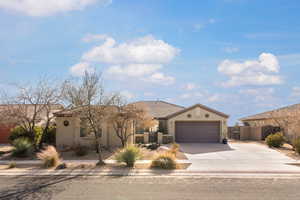 View of front of property with a garage