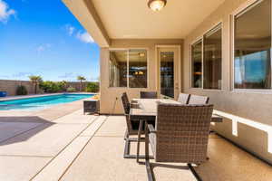 View of patio featuring a fenced in pool