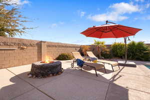 View of patio / terrace featuring an outdoor fire pit