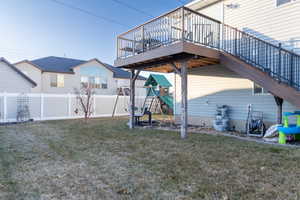 View of yard with a wooden deck