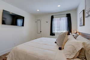 Bedroom featuring hardwood / wood-style floors