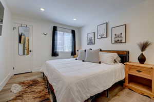 Bedroom featuring light hardwood / wood-style floors