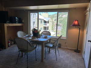 View of carpeted dining space