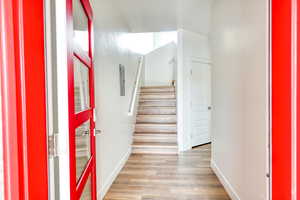 Foyer featuring light hardwood / wood-style floors and electric panel