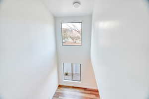 Interior space with hardwood / wood-style flooring