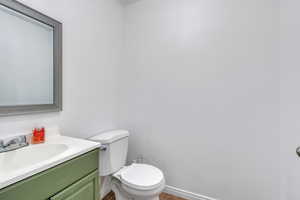 Bathroom with vanity and toilet