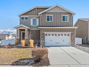 View of front facade featuring a garage