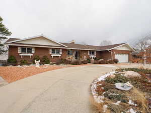 Ranch-style home with a garage