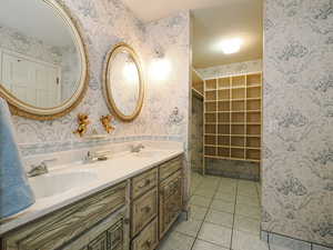 Bathroom with vanity and tile patterned floors