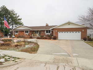 Ranch-style home with a garage