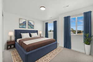 View of carpeted bedroom