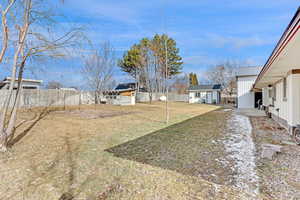 View of yard with a shed