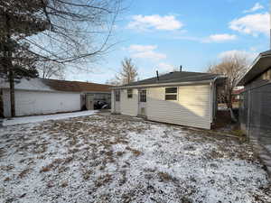 View of snow covered property