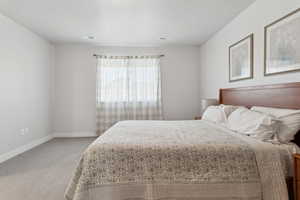 Bedroom featuring carpet