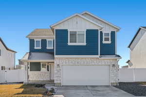 View of front of property with a garage