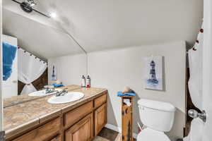 Bathroom with vanity and toilet