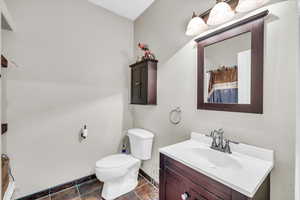 Bathroom with vanity and toilet