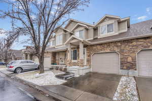 View of front of property with a garage