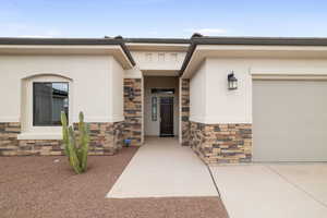 Property entrance with a garage