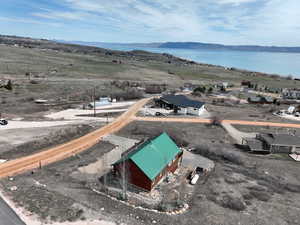Bird's eye view with a water and mountain view