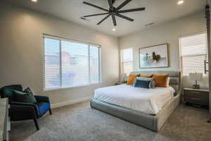 Bedroom featuring carpet floors and ceiling fan