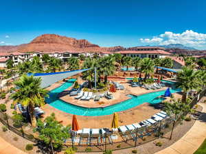 View of swimming pool featuring a mountain view and a patio