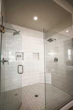 Bathroom with a shower with door