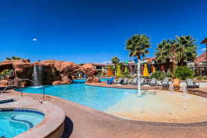 View of swimming pool featuring pool water feature