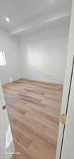 Empty room featuring light hardwood / wood-style floors