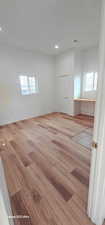 Spare room with light hardwood / wood-style floors