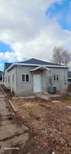 View of front of home featuring cooling unit