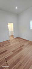 Unfurnished room featuring light wood-type flooring